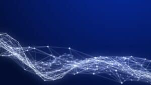 Abstract digital neural network wave on blue background representing Large Language Models and AI language processing for an article on What Are LLMs.